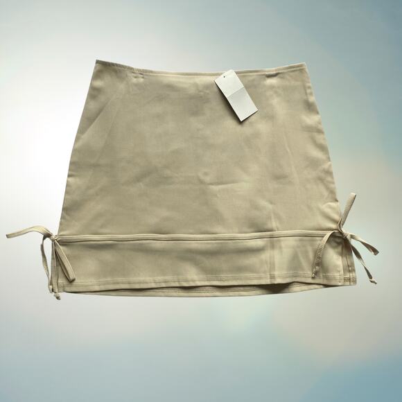 E.N.T. Beige Skirt with Bows - Picture 1 of 7